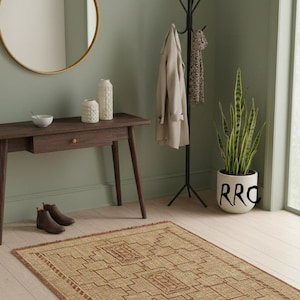 Authentic African Tuareg rug for modern farmhouse interiors with woven natural fiber and leather border details