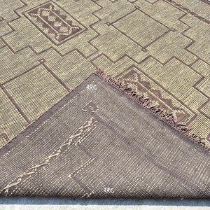 Handwoven Moroccan Tuareg carpet made from natural fiber jute and leather for bohemian floor decor ideas