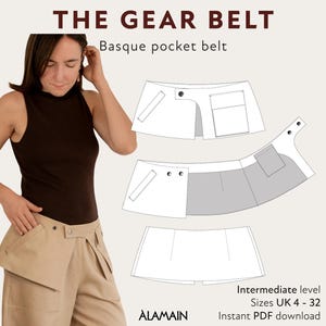 May include: The Gear Belt Basque pocket belt sewing pattern features technical line drawings of a tan utility belt with pockets and snap closures. The text includes THE GEAR BELT, Basque pocket belt, Intermediate level, Sizes UK 4 - 32, and ALAMAIN.