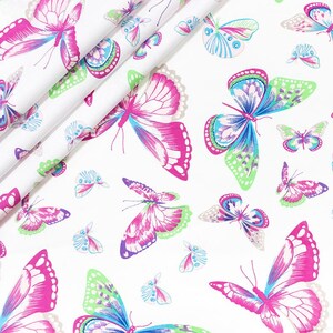 Katoenen vlinderstof, kleurrijke vleugels op wit op maat gesneden