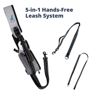 May include: A hands-free dog leash system with multiple components. The main harness is gray and black with white stitching and a small pouch. The leash system includes a detachable leash and additional attachments. The text "5-in-1 Hands-Free Leash System" is displayed.