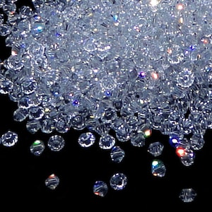 24pc - 2.5mm Swarovski Crystal Clear BiCone Spacer Beads Style 5301 aka 5328