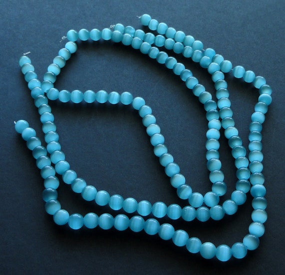 1 Strand Of Turquoise Colored Globe Shaped Austria Style Crystal