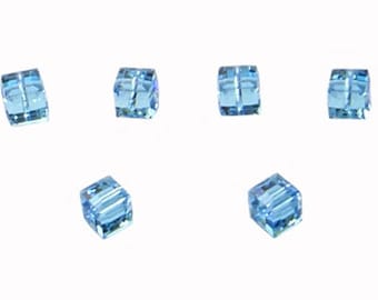 May include: Six light blue crystal beads in a square shape.