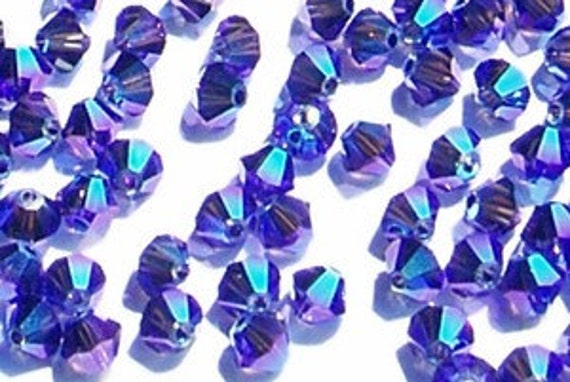 12pc Swarovski Crystal Topaz AB2X 6mm Bicone 5328 Beads; SALE PRICE
