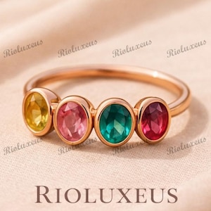 Elegante anillo ovalado con múltiples piedras preciosas, delicada joya colorida con múltiples piedras de nacimiento.