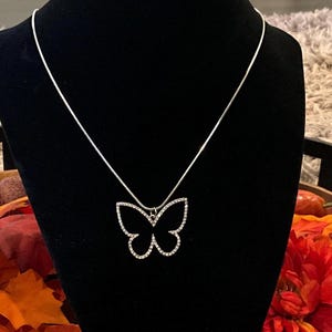 Rhinestone butterfly pendant necklace on 18&quot; sterling silver toned solid chain