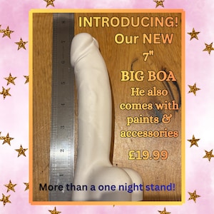 May include: A white phallic-shaped sculpture positioned next to a metal ruler showing a length of 7 inches. The text on the image reads: INTRODUCING! Our NEW 7" BIG BOA He also comes with paints & accessories &pound;19.99 More than a one night stand!