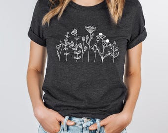 Camisa floral minimalista con arte lineal de flores silvestres