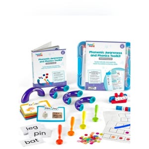 May include: A collection of educational tools for phonics and literacy. Includes a teacher's guide, a small group set, and various manipulatives in bright colors. The set features word cards, letter cards, and colorful counters.