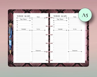 Può includere: Inserto per planner formato A5 con un design art déco. Le pagine bianche presentano sezioni per "Today Again", "Top Three", "Meals", "Schedule" e "To Do". Una penna blu con dettagli dorati è appoggiata sul lato sinistro.