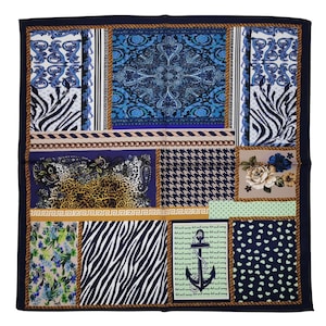 May include: A square scarf with a patchwork design featuring various patterns. The patterns include zebra stripes, floral prints, paisley, and houndstooth. The scarf has a navy blue border and a rope-like trim.