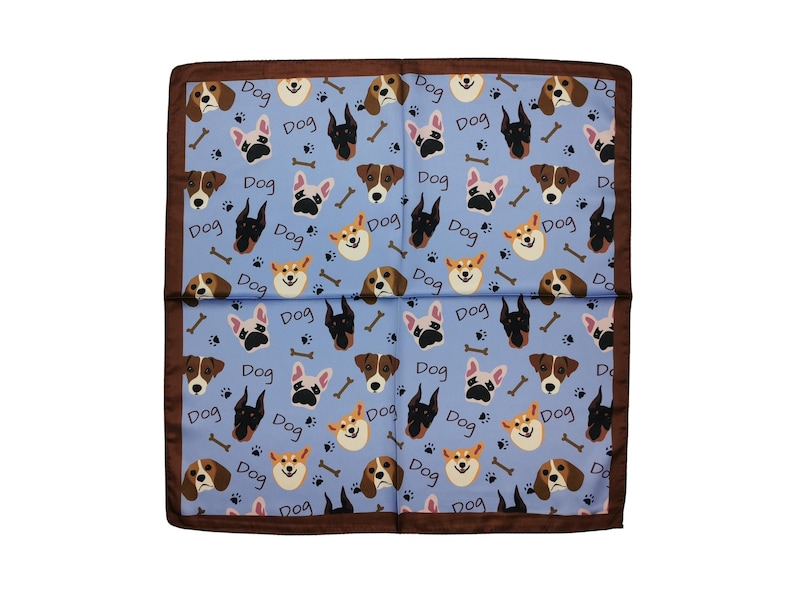 May include: A square, light blue scarf with a repeating pattern of various dog breeds, bones, and the word "Dog". The scarf has a brown border.