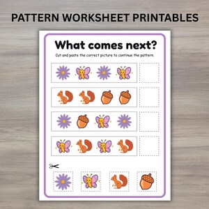 Könnte beinhalten: Ein ausdruckbares Muster-Arbeitsblatt mit dem Text 'PATTERN WORKSHEET PRINTABLES' und 'What comes next? Cut and paste the correct picture to continue the pattern.' Es zeigt Reihen von Blumen, Schmetterlingen, Eichhörnchen und Eicheln.