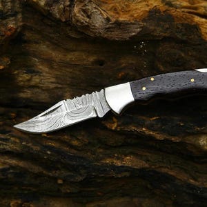 Handmade Damascus Steel Folding Pocket Knife: Ebony Wood Handle, Leather Sheath