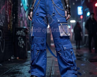 May include: Bright blue cargo pants featuring multiple utility pockets, silver-toned metal chains, D-rings, and adjustable buckled straps. The pants include a black belt with a pentagram buckle, ribbed knee panels, and metallic mesh pocket accents.