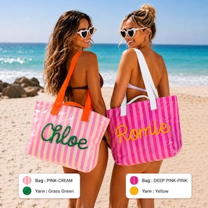 May include: Two rectangular tote bags with vertical stripes. The first bag is pink and cream with orange straps and the name Chloe embroidered in grass green yarn. The second bag is deep pink and pink with white straps and the name Romie in yellow.