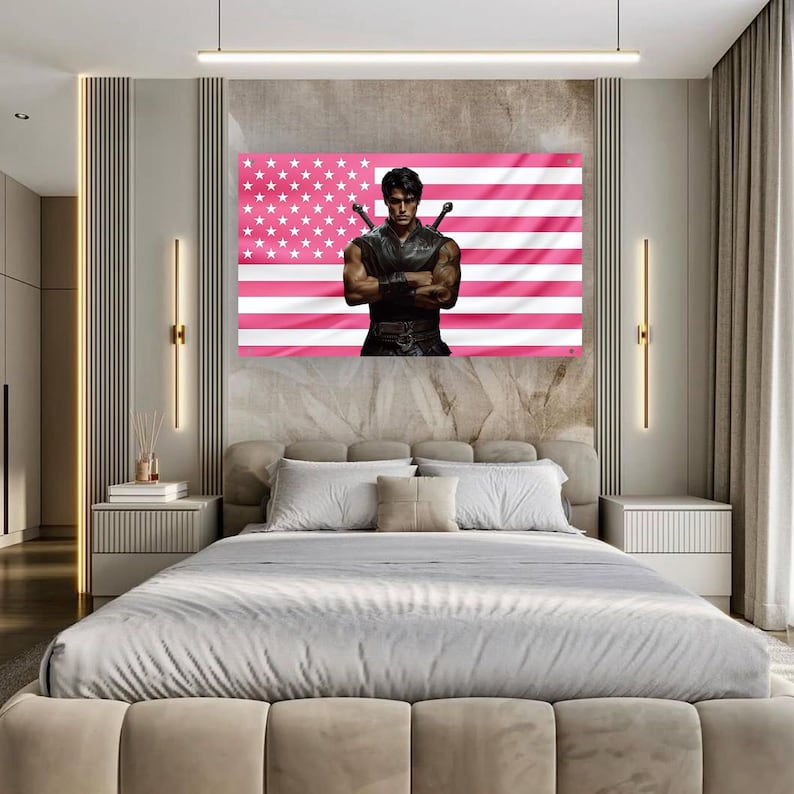 May include: A large wall art piece featuring a muscular man with swords, set against a pink American flag. The artwork is displayed above a bed with a neutral color palette, creating a modern and stylish bedroom aesthetic.