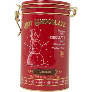 May include: A red metal container of hot chocolate mix. The container has gold accents and a gold clasp. The words "Hot Chocolate" are in gold lettering. A snowman illustration is on the front. The container holds 8 oz (226.79g) of hot chocolate mix.