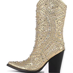 Gold western-style boot with rhinestone embellishments and chunky high heel