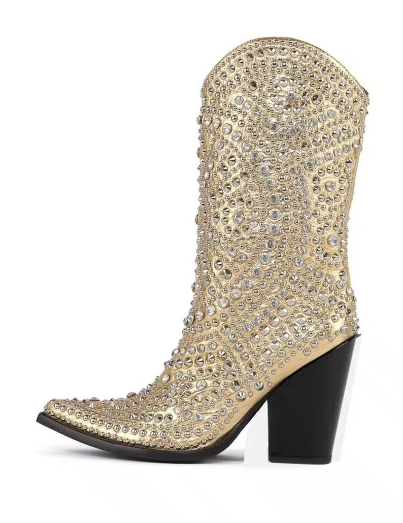 Gold western-style boot with rhinestone embellishments and chunky high heel