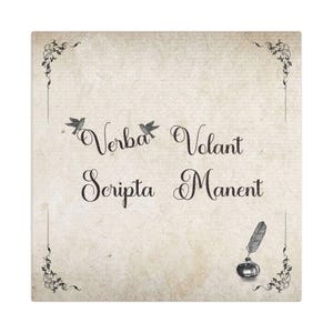 May include: Square print with the Latin phrase "Verba Volant, Scripta Manent" in elegant script. The design features two small bird illustrations, decorative corner flourishes, and a quill and inkwell. The background has a textured, aged paper appearance.