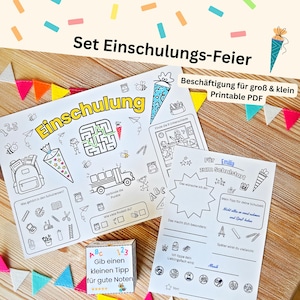 May include: A set of printable school-themed activity sheets and a small cube with text. The sheets feature illustrations of school supplies, a school bus, and a maze. The text includes "Einschulung" and "Printable PDF". Colorful confetti and felt pennants decorate the scene.