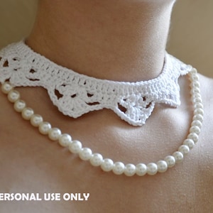 May include: A white crocheted collar necklace with a scalloped edge, worn over a pearl necklace. The text "PATTERN FOR PERSONAL USE ONLY" is visible at the bottom of the image.