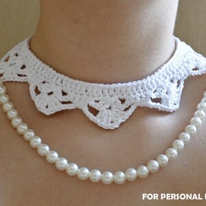 May include: White crocheted choker necklace with a scalloped edge, worn over a pearl necklace. "FOR PERSONAL USE ONLY" is written in the bottom right corner of the image.