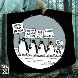 May include: Black tote bag featuring a cartoon of penguins protesting on an icy landscape. The penguins hold signs that read "We're Cold Enough!", "Fish Are Friends Not Food", "Our Ice, Rights", "Blubber Is Beautiful", and "Waddle For A Cause".