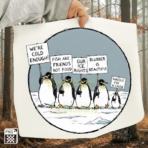 May include: A cartoon illustration of penguins holding signs with messages like "We're Cold Enough!" and "Fish Are Friends Not Food." The penguins are in a snowy environment, advocating for their rights. The image is held by a person.