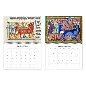 May include: A 2027 wall calendar featuring two pages for January and February. Each page displays a medieval-style illustration of figures with spears facing a large bull, one red and one blue, alongside a grid of dates for the respective month.