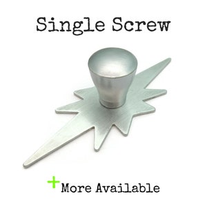 May include: A silver metal knob with a starburst base. The knob is a single screw design. "Single Screw" is written in black text above the knob.