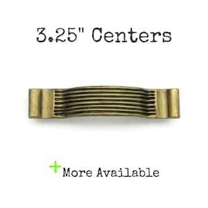 May include: A set of three ceramic mugs with a speckled, cream-colored glaze. Each mug features a different hand-painted floral design in shades of blue, green, and yellow. The mugs have a simple, rounded shape and a comfortable handle.