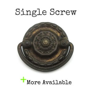 May include: A set of three ceramic mugs with a speckled, matte finish. The mugs are in shades of cream, light gray, and dark gray. Each mug has a simple, minimalist design, perfect for coffee or tea.