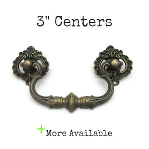 May include: A handmade wooden sign with the text "Welcome to our home" in a handwritten style. The sign is painted white with black lettering and a distressed finish, perfect for home decor.