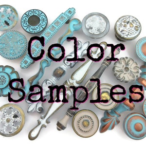 May include: A collection of decorative cabinet knobs and drawer pulls in various colours and styles. The knobs and pulls are made of metal and have a distressed finish. The colours include turquoise, white, and brown. The text "Color Samples" is displayed in the centre of the image.