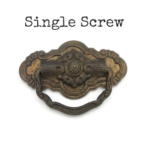 May include: A handmade wooden sign with the text "Welcome to our home" in a handwritten style. The sign is painted white with a dark stained frame. A small, decorative heart is in the bottom right corner.