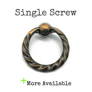 May include: A circular metal drawer pull with a twisted rope texture and a dark bronze finish. The hardware features a central mounting point and is labelled with the text Single Screw above and More Available with a green plus sign below.