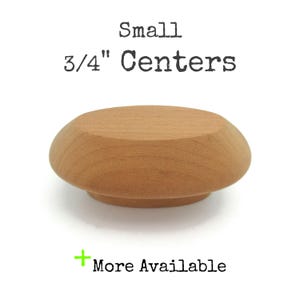 May include: A small, light brown wooden knob with a 3/4" center to center measurement. "Small 3/4" Centers" is written above the knob.