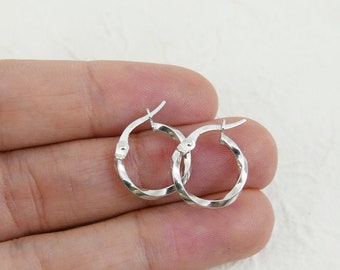 14Kt small white hoops earrings. Dainty white gold 14kt hoop gold earrings. gold hammered huggies earrings. 14kt texture elegant earring