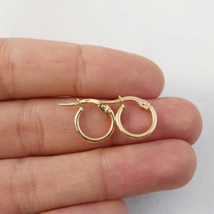 Small 14Kt 11.5mm real yellow gold hoops earrings. Dainty 14kt yellow gold hoop earrings. huggies earrings. 14kt texture elegant earring