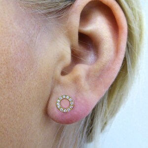 14K gold circle earrings. Elegant gold circle stud earrings. Gold post earrings. Gold earrings. gold round crystal studs. gold studs