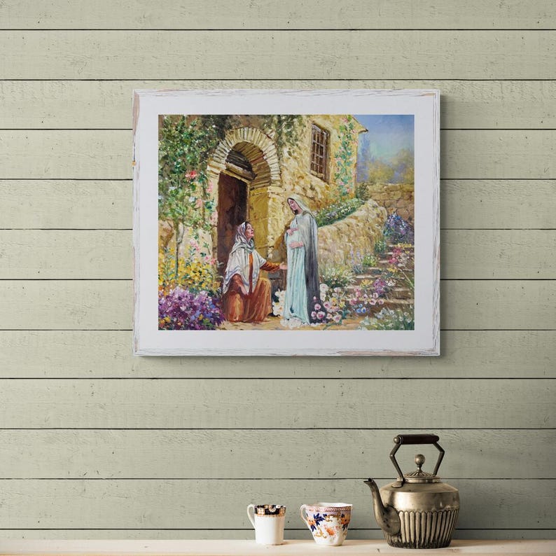 May include: A framed painting depicting a religious scene. Two figures are in front of a stone building with an arched doorway. The scene is filled with flowers and greenery, with a warm, inviting color palette.