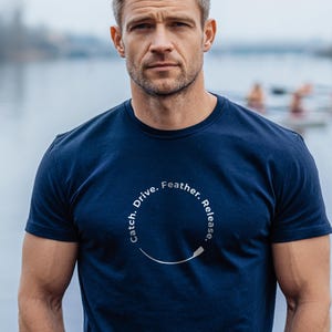 May include: A set of three ceramic mugs with a speckled, matte finish. The mugs are in shades of cream, light gray, and dark gray. Each mug has a simple, minimalist design and a rounded handle.