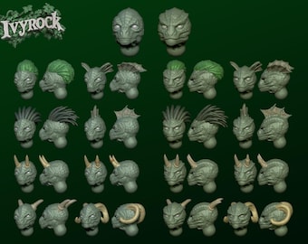 May include: A collection of twenty-four miniature lizard-like creature heads in various styles, including options with green hair, fins, horns, and curved ram-like horns. The text IVYROCK is displayed in the top left corner of the image.
