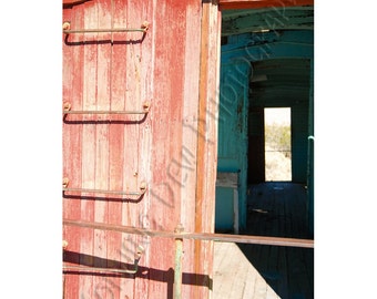 Caboose - Matted Photograph of an old caboose in the ghost town of Rhyolite