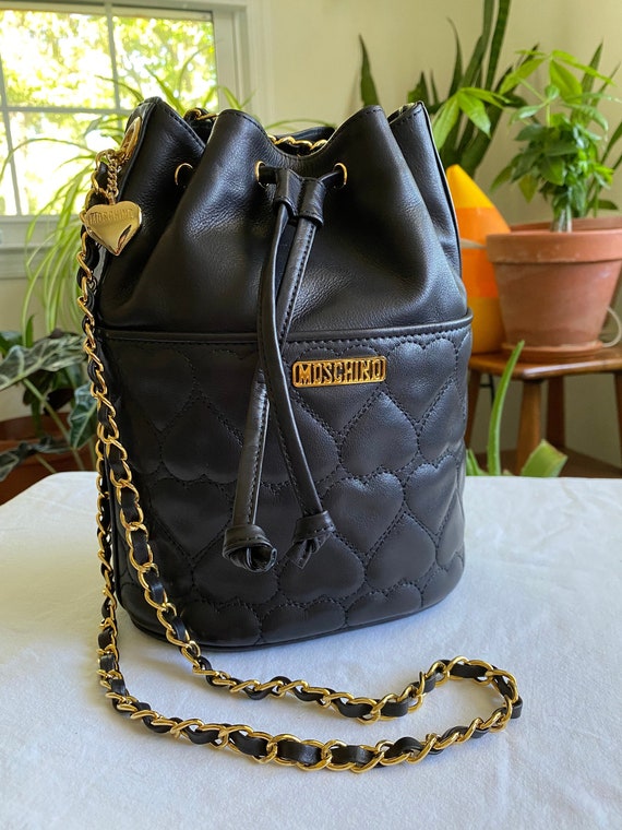 Authentic Moschino black gold chained bucket bag - image 1