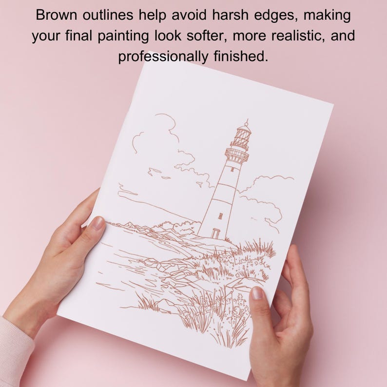May include: A white paper with a brown outline drawing of a lighthouse on a rocky shore. The text at the top reads, "Brown outlines help avoid harsh edges, making your final painting look softer, more realistic, and professionally finished."