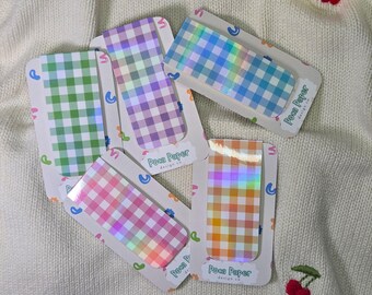 Marcapáginas magnético de cuadros vichy, laminado brillante u holográfico.